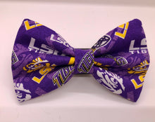 Load image into Gallery viewer, Koa's Ruff Life, Koa in a large LSU Tigers purple bow tie for dog