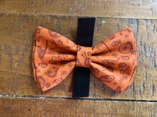 Load image into Gallery viewer, Koa's Ruff Life, the oraange fishing tale bow tie. Includes images of bate, net, hook, nike and fish.